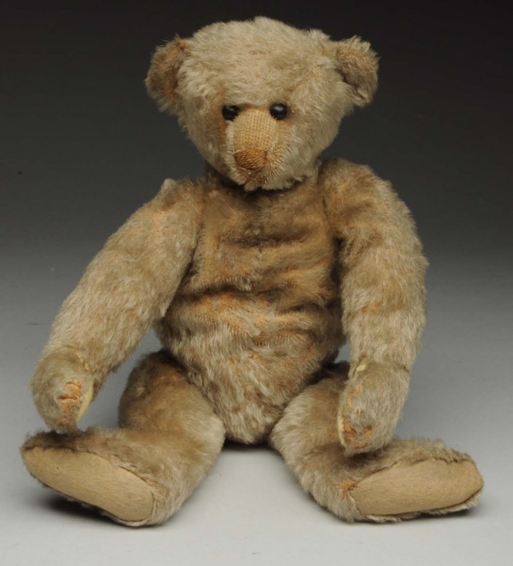 Early Mohair Bear.: Fully jointed with shoe button eyes, shaved muzzle, brown sewn nose and mouth, felt paw pads (hand ones replaced, brown stitched claws. Stuffing soft, quite a bit of fur loss on torso and arm. Appears