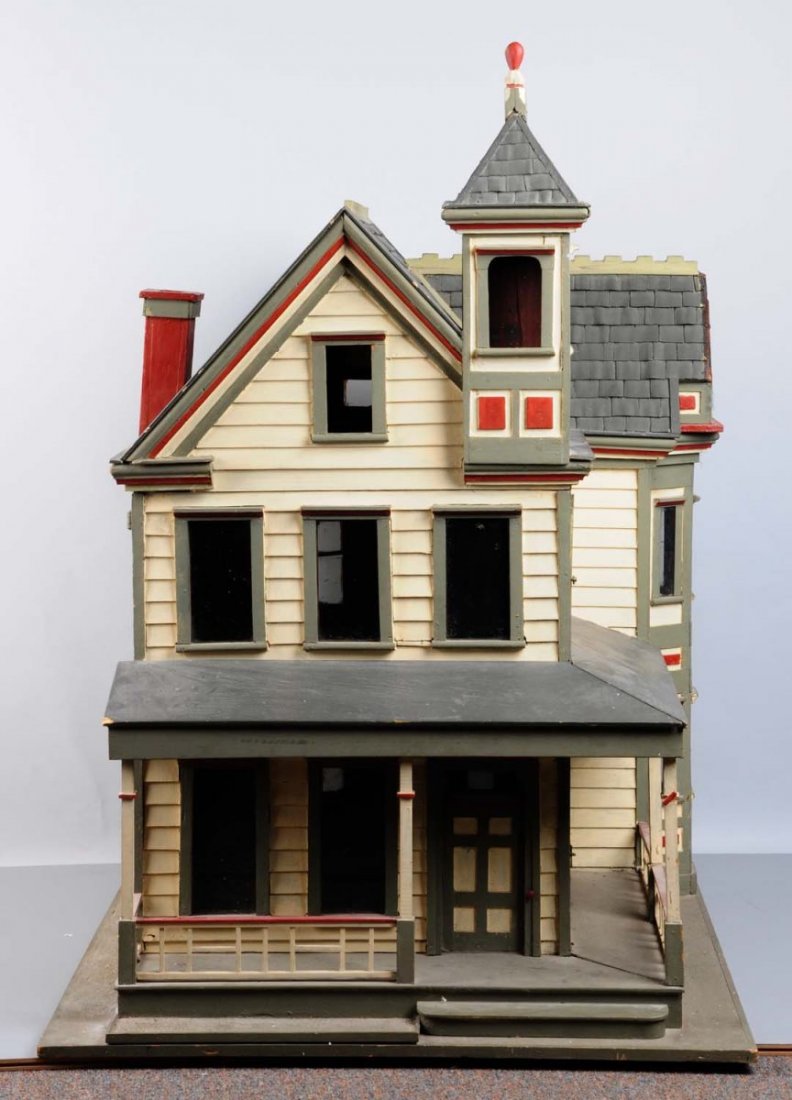 Huge Victorian Doll House.: This doll house retains all original paint. Just a few small areas of minor damage here and there. All glass windows. One of the nicer examples we've seen. Condition (Very Good Plus). Size 44" T.
