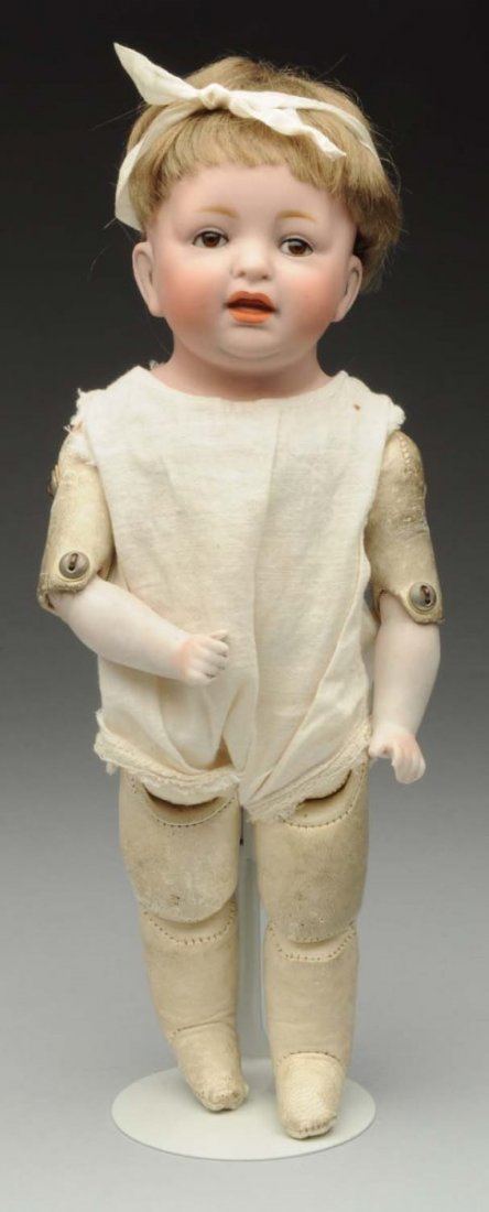 Rare Kestner Character Baby Doll.: German bisque shoulder head incised “238 JDK 6” made by J.D. Kestner with original bobbed mohair wig, plaster pate, sleeping eyes, open/closed mouth; original kid body with bisque lower arms, anti
