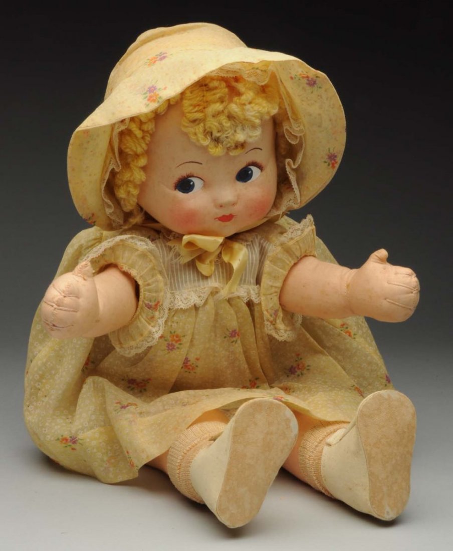 Effanbee Cloth “Pat-O-Pat” Doll.: Mask face with painted features and curly yarn hair, original outfit with matching hat, undies, shoes and socks (overall light soil). When button is squeezed on her chest, she claps her hands. Rarely