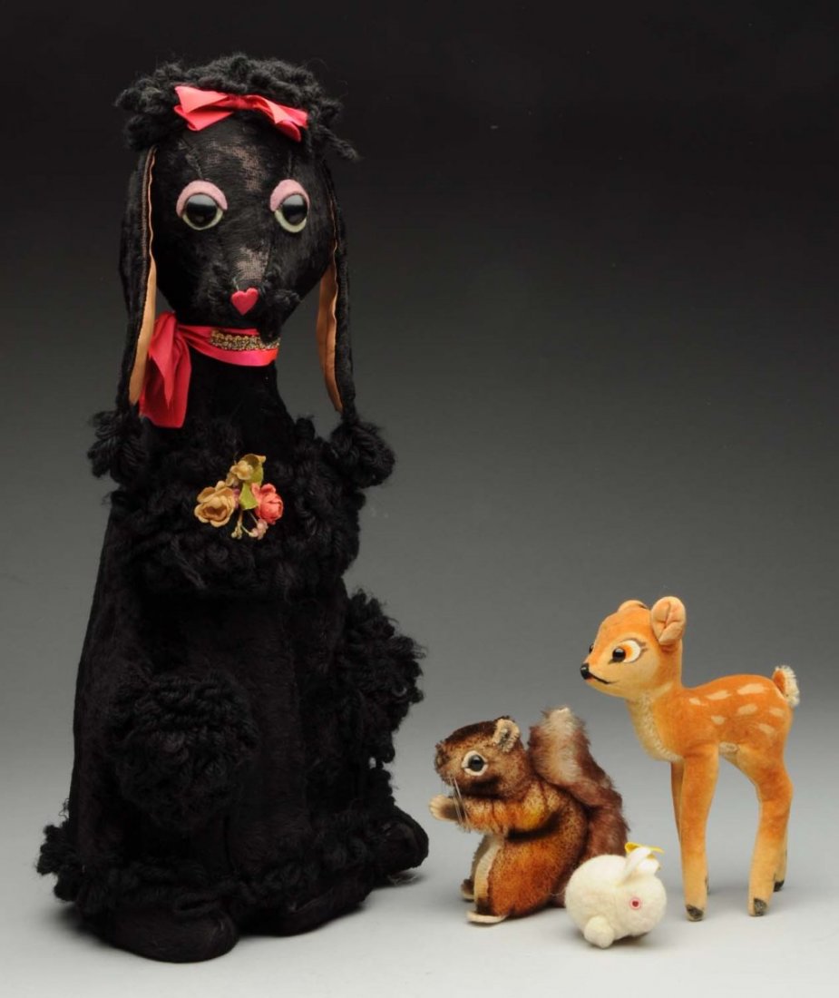 Lot of : Alexander and Steiff Animals.: Madame Alexander black poodle with tag on the bottom, along with Steiff wooly rabbit with all ids, Bambi from the 1950s to reflect the Disney movie, and a squirrel. Very rare to find the Alexander poo