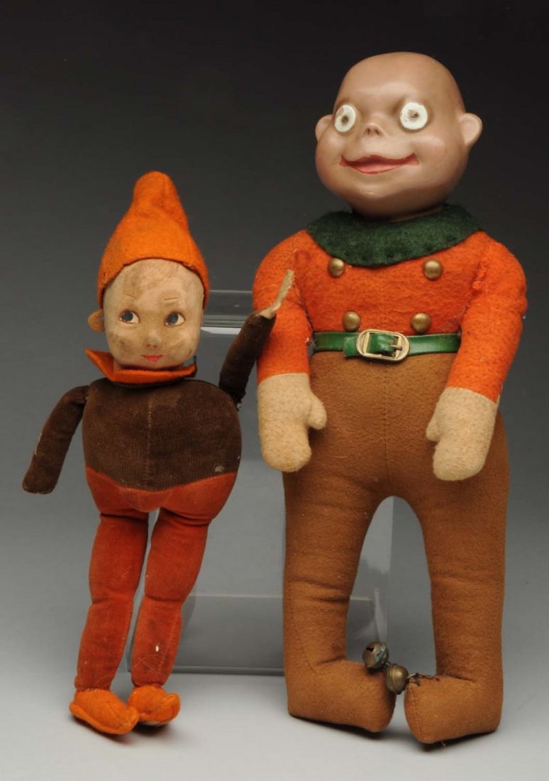 Lot of 2: Pre - War Palmer Cox Brownie Dolls.: One is all felt; missing right hand. Second one is felt with composition type head. The smaller one is marked "Made in England by Norah Wellings". Both depict Palmer Cox brownies. Some soiling and mot