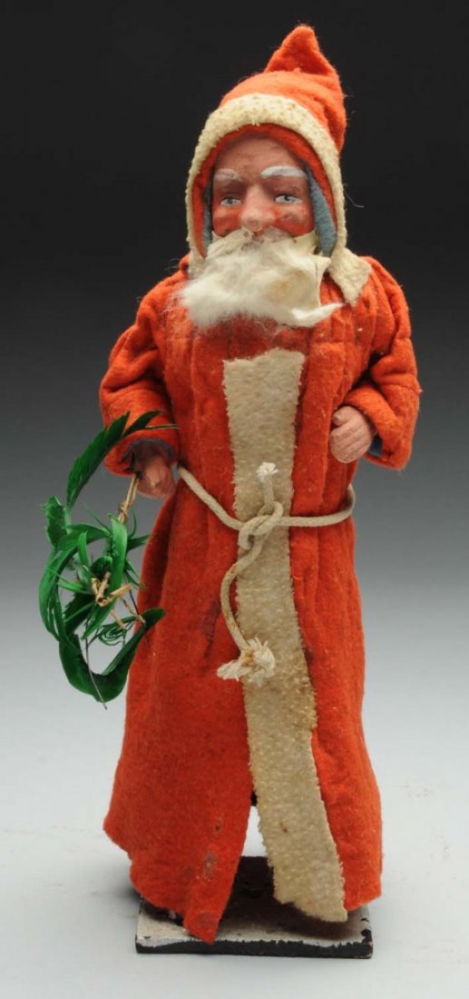 German Santa Figure.: This Santa has crazing to his boots and partially missing moustache. Condition (Very Good). Size 12" T.