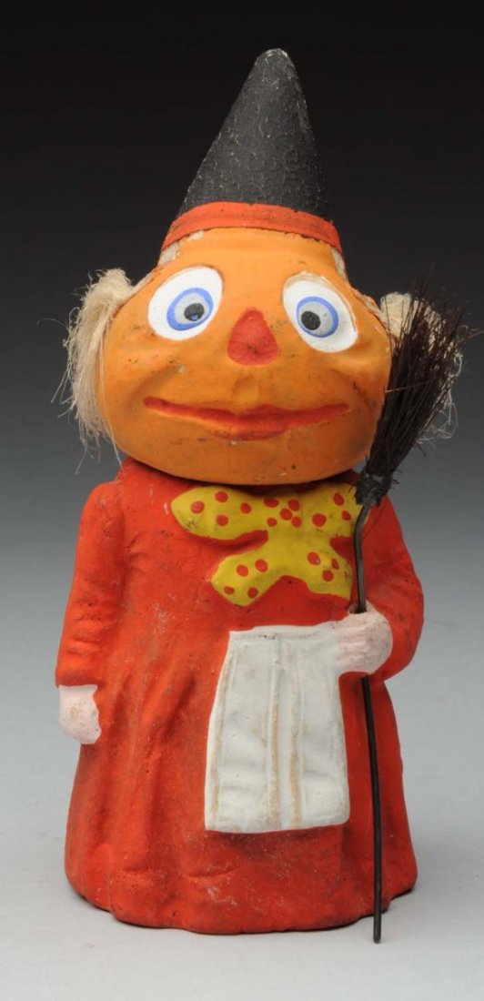 Pumpkin Head Witch Candy Container.: This German candy container has a few small areas of loss to the head. Condition (Very Good Plus). Size 5" T.