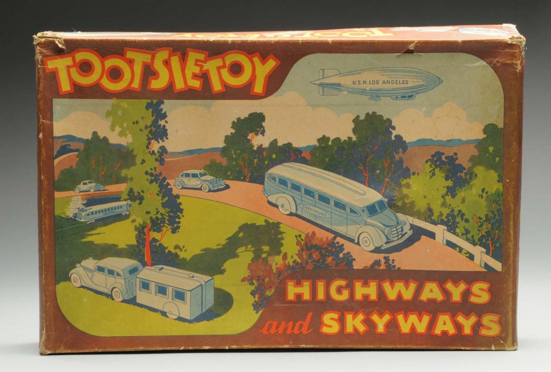 Tootsietoy Set No.5300 Die Cast Vehicle Set.: Die Cast Vehicles. Includes: Original box with beautiful colored graphics of early vehicles; Marked "Highways and Skyways", original inserts, two greyhound buses, TWA airplane, two Las Angels zeppelin