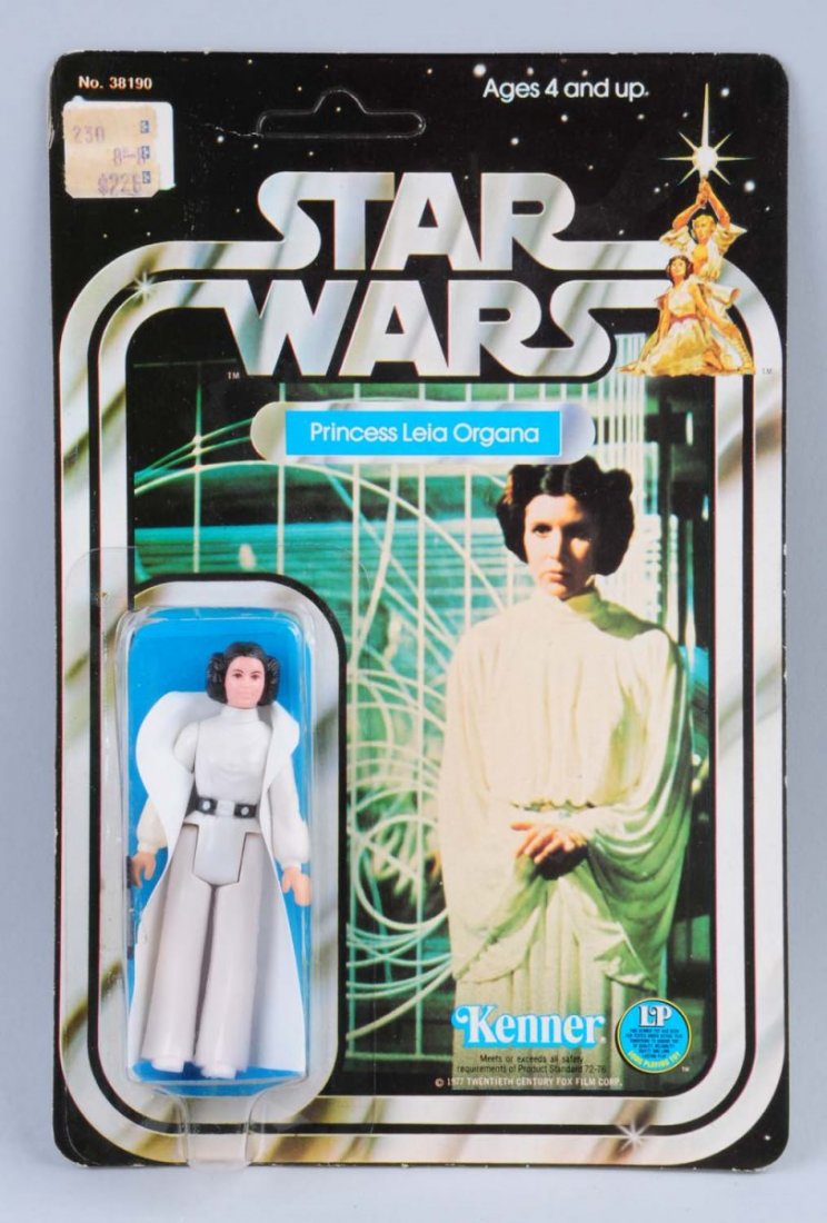 Star Wars Princess Leia Organa Carded Figure: Circa 1977, Kenner, Hong Kong. Unpunched. The original price tag is attached on the upper left hand corner of the card. There is one very slight creased one inch section next to the price tag and one