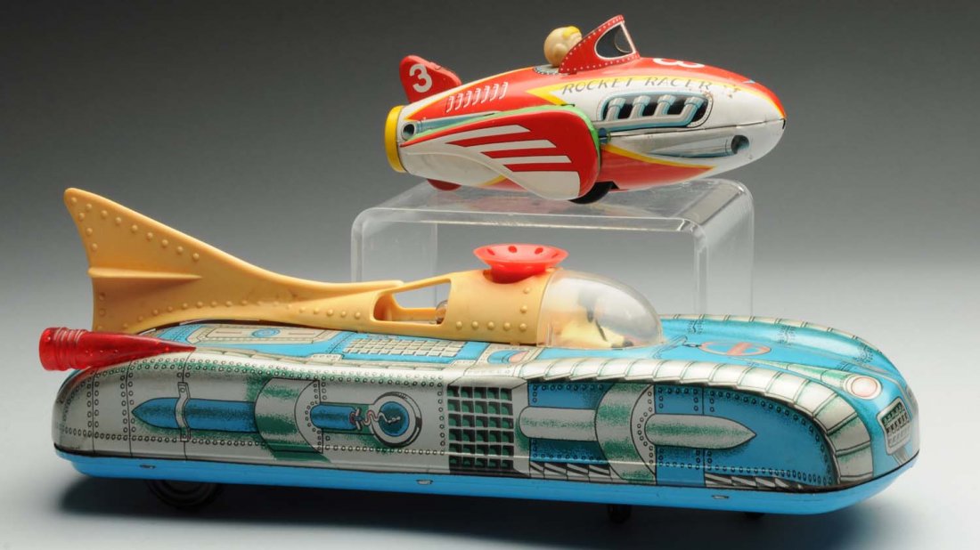 Lot of 2: Foreign Made Space Vehicles.: Includes one Japanese friction rocket racer, which is tin litho with a vinyl head marked "No. 3 Rocket Racer." Also includes battery operated space vehicle made in Hungary. Missing styrofoam ball on t