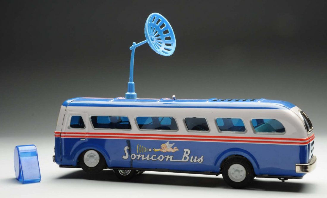 Japanese Battery Operated Sonicon Bus.: Includes original box with nice color graphics. Complete with instruction pamphlet, whistle and antenna. Some creasing and wear to the box. Very little wear to the toy. Condition (Very Good - Excellen