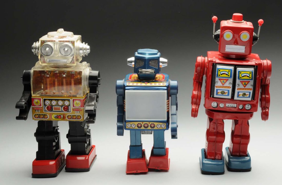 Lot of 3: Japanese and Chinese Batt. Op. Robots.: Includes all original boxes. Japanese video robot made by S.H., Japan, and piston action robot made by S.H., Japan, and a Chinese space walk man. Slight creasing to boxes. Condition (Very Good). Size