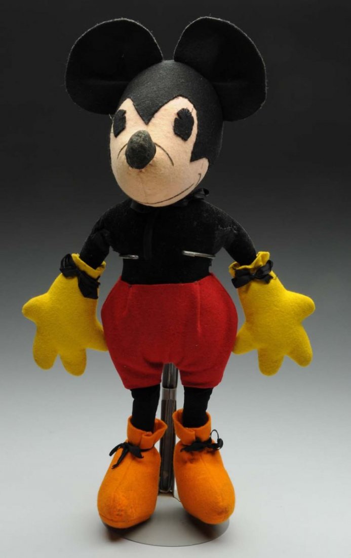 Vintage Walt Disney Mickey Mouse Stuffed Doll.: Looks like it could be a McCall's pattern doll. Nicely done. No real moth damage. Pie-eyed. Missing tail. Condition (Excellent). Size 15" T.