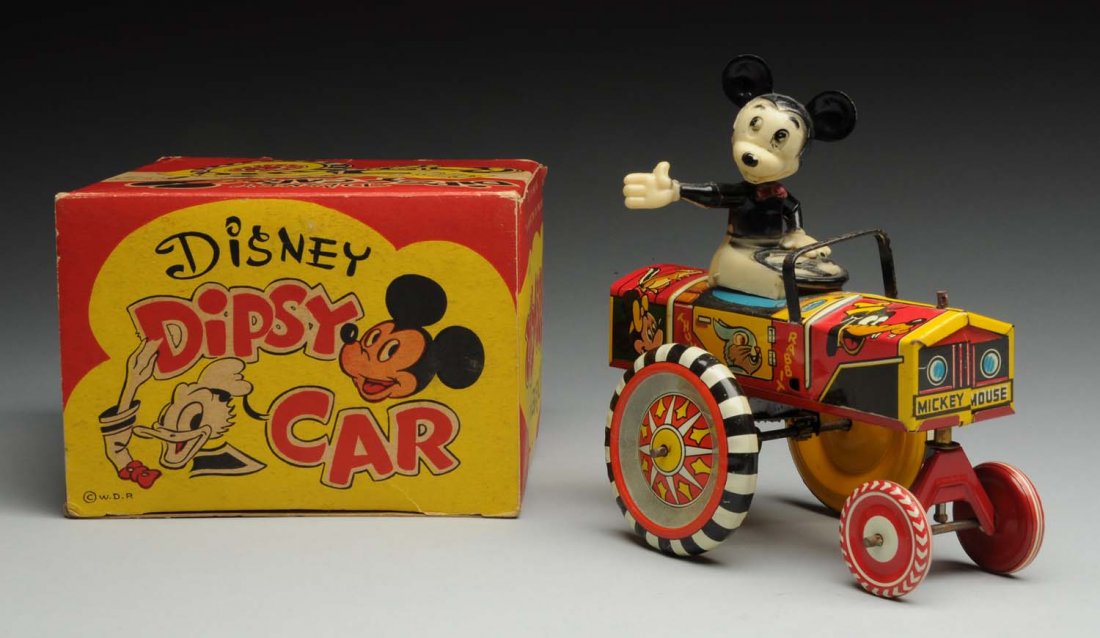 Marx Wind-Up Walt Disney Mickey Mouse Dispy Car.: Includes original box, which is complete but does have some creasing and wear. Also includes plastic Mickey Mouse head and arm. Arm does looks like it was broken off and glued back on. Marked "Walt Di