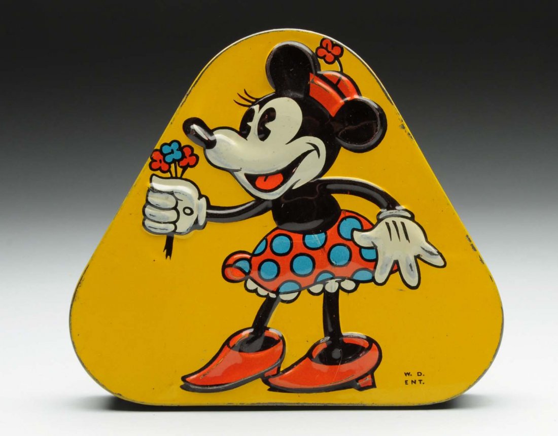 Minnie Mouse Triangular Australian Tin.: Circa 1930s, Australia. Colorful lithographed and embossed image of Minnie in high heels holding flowers. Minor edge wear with strong color and beautiful gloss. Condition (Excellent). Size 5 - 7/8"