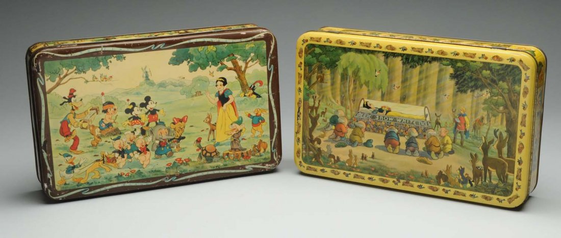 Lot of 2: Large Belgium Disney Character Tins.: Circa 1938. Lavishing illustrated Disney scenes, both have locking mechanisms with a key hold in side, but no keys. "Disneyland" shows almost 40 different early characters, including; Mickey, Minnie, 
