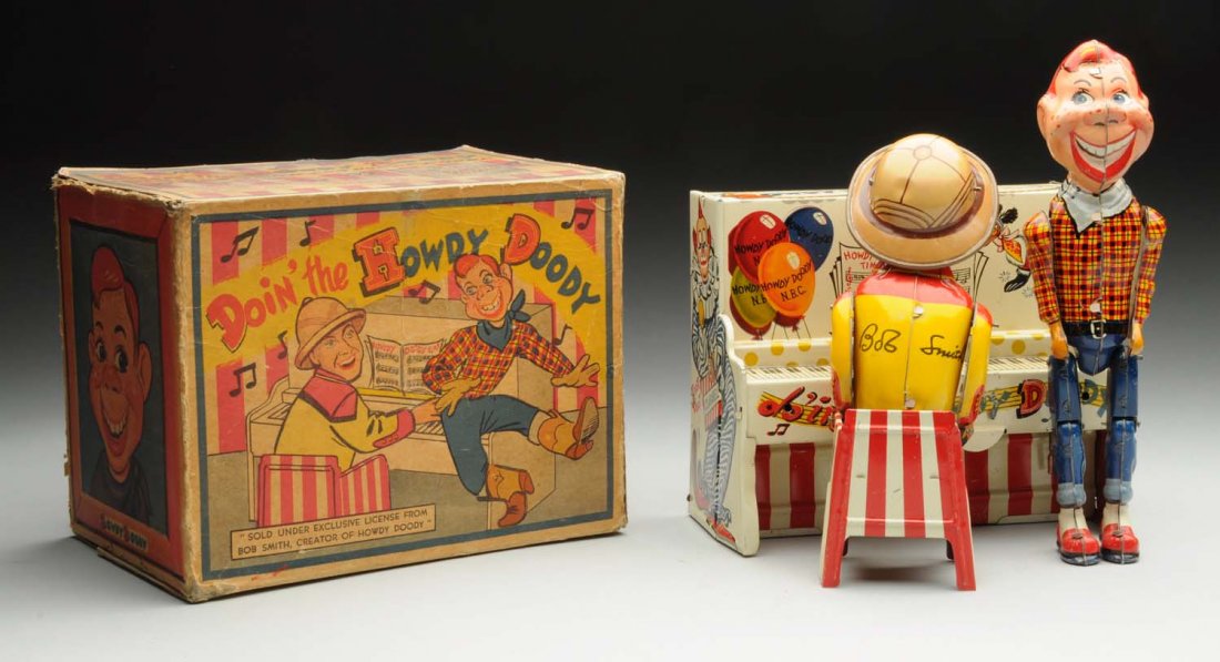 Unique Art Tin Litho Wind-Up Howdy Doody Band.: Depicts Bob Smith playing piano while Howdy Doody dances. Includes original box. Box has some creasing and wear, laser copied top lid, and some restoration on the sides. Toy has some minor scratching