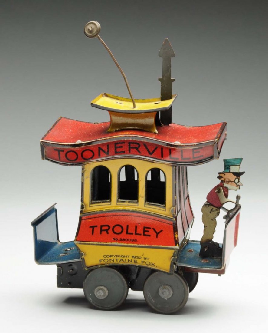 German Nifty Tin Wind-Up Toonerville Trolley Toy.: Nice action toy marked "Copyright 1922 Fontaine Fox." Original stack and poll. Nice shiny colorful litho. Condition (Excellent). Size 7" T.