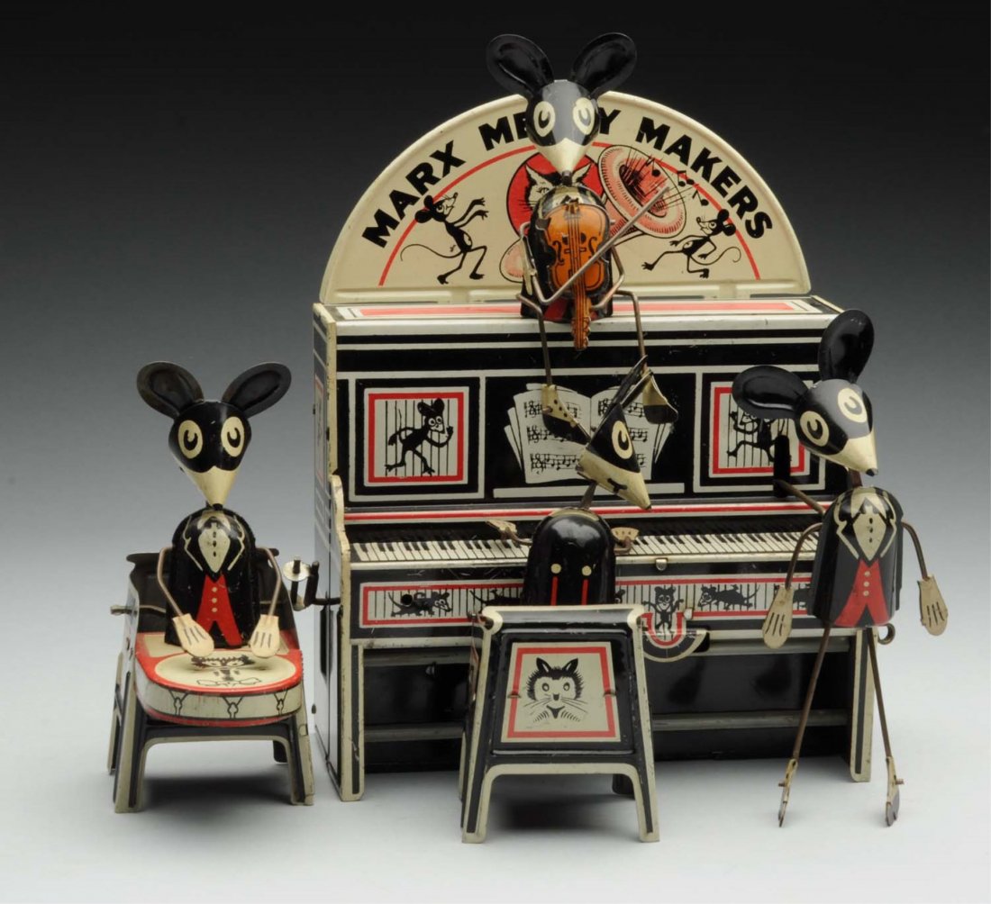 Marx Tin Litho Wind-Up Merry Makers Band.: All original. Best variation with marquee back piece and violin player. Minor scratching to piano. Condition (Excellent). Size 9" L.