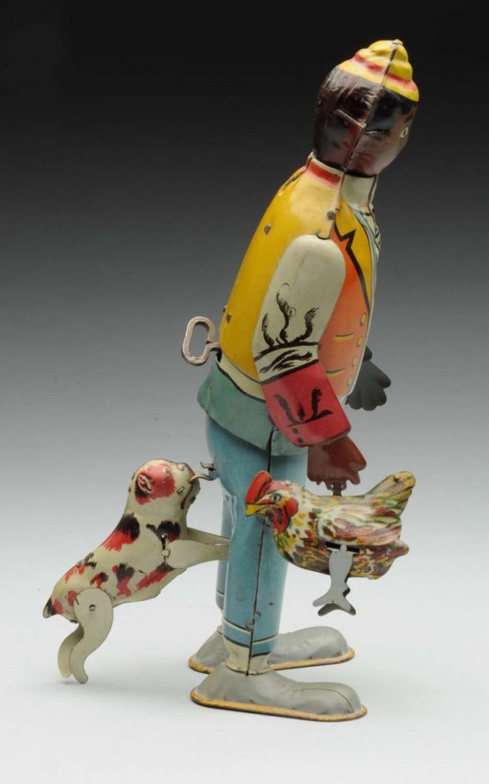 Marx Wind-Up Hey Hey The Chicken Snatcher Toy: Tin litho. Complete with original arms, chicken and dog. Very popular early Marx toy. Marked on bottom "1926 Hey Hey the Chicken Snatcher." Some minor fading and scratching. Condition (Very Good). Siz