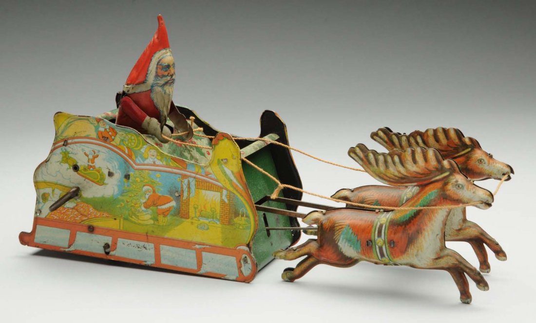 Strauss Tin Litho Wind-Up Santee Claus Toy.: Santee Claus has original arms. Bell is missing off the front of reindeer, and is also missing the guide wheel on the bottom of the reindeer. Some general overall fading and wear. Some scratching thro