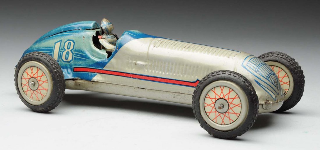 Unusual Tin Litho Japanese Race Car Toy.: This wind - up toy has full lithograph driver marked "18" on both sides of rear. Also marked "Fairylite Racer". Looks similar to early German pre - war Tippco Race car. Some minor scratching and wear 