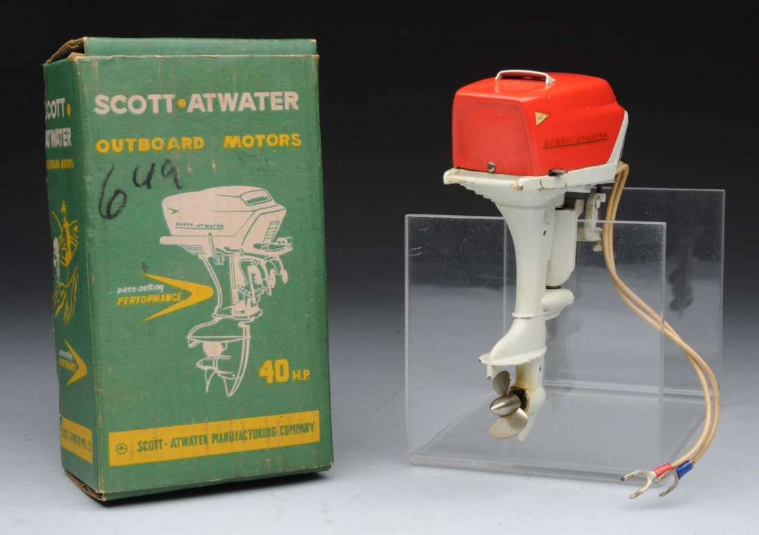 Battery-Operated Scott Atwater Toy Boat Motor.: This Japanese toy includes colorful original box, box has cardboard insert as well as instruction sheet. Motor has Scott Atwater decals on both sides. Minor chipping and wear to base of motor and also