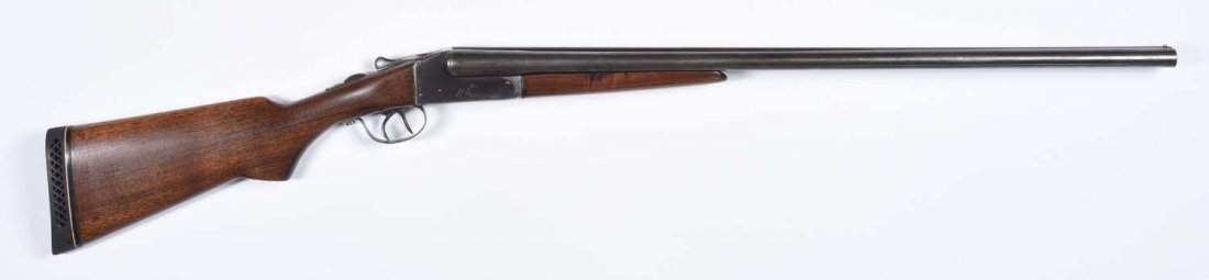 Western Field Long Range SxS 16 Ga. Shotgun.**: Serial No. 32781. Manufactured 1930 to 1940. Barrel length: 28". Chamber length: 2-3/4". Choke dimension: R - mod, L - full. Length of pull: 14" to 1" pad. Drop on heel: 3-1/2". Barrel and frame are p