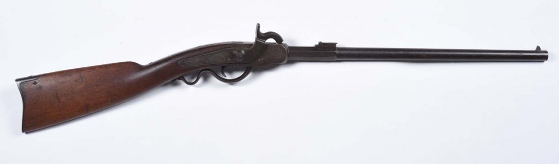 Cosmopolitan Breach-Loading Civil War Carbine.: Serial No. 4445. Manufactured by the Cosmopolitan Arms Co. 1859 to 1862. Standard features include .52 caliber, percussion, breach-loader, single shot falling block, 19" barrel, iron mountings, blue f