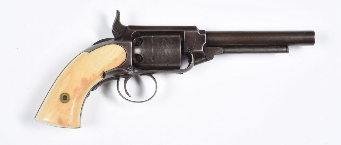 James Warner Pocket Model Percussion Revolver.: Serial No. 6053. Manufactured from 1857 to late 1860s. This is a second model first variation with 4" round barrel, .28 caliber percussion, single action, five shot, percussion, with old bone grips. T