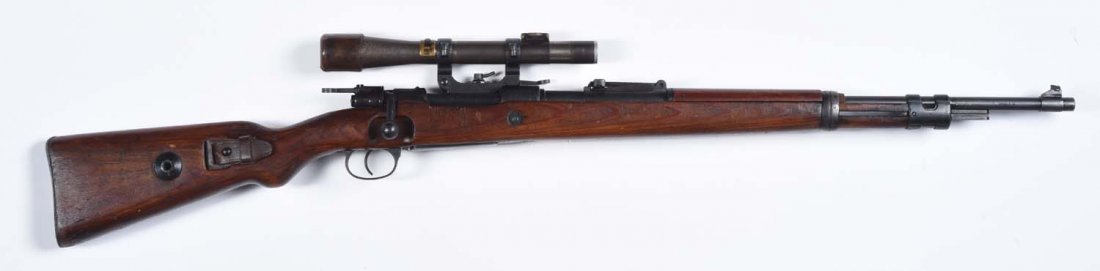 Nazi Issue Model 98K Mauser Carbine.**: Matching on barrel, receiver, and stock. 2736 on trigger guard, 8457 on floorplate, 8673 on nosecap. Has an import stamp on the barrel. Caliber 7.92x57mm. Barrel is 23.62". Manufactured by Steyr-Daiml