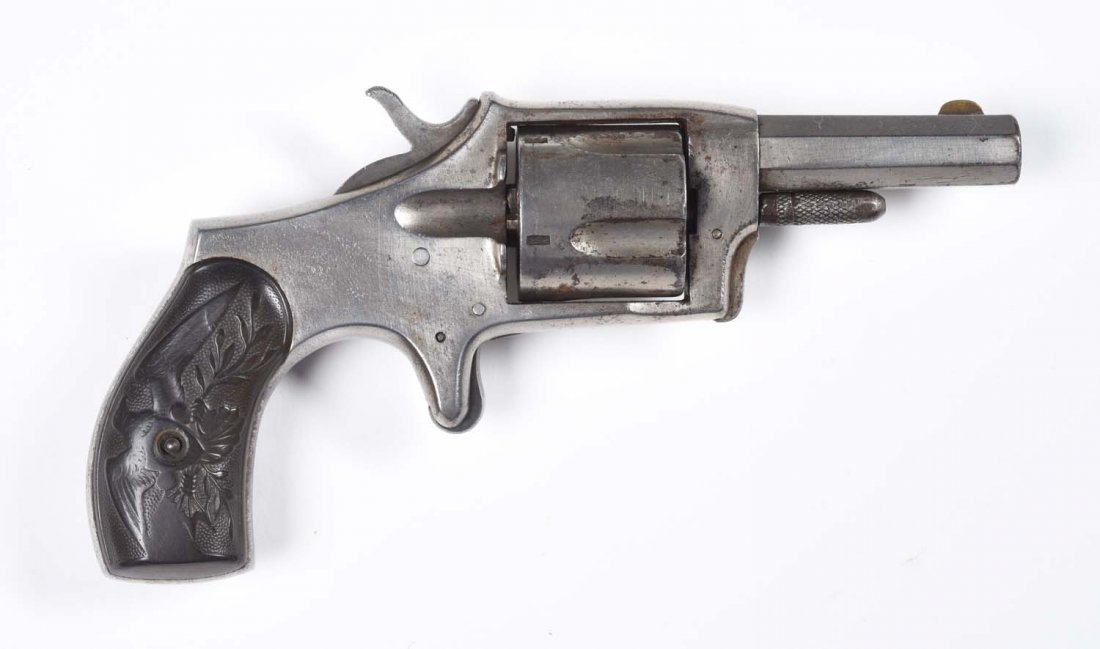 Spur Trigger Single Action Pocket Revolver.: One of the myriad of private label pocket revolvers manufactured in the 19th century. This one is simply stamped "Smoker" on top strap. It is similar to most of the era spur triggers. Features five sh