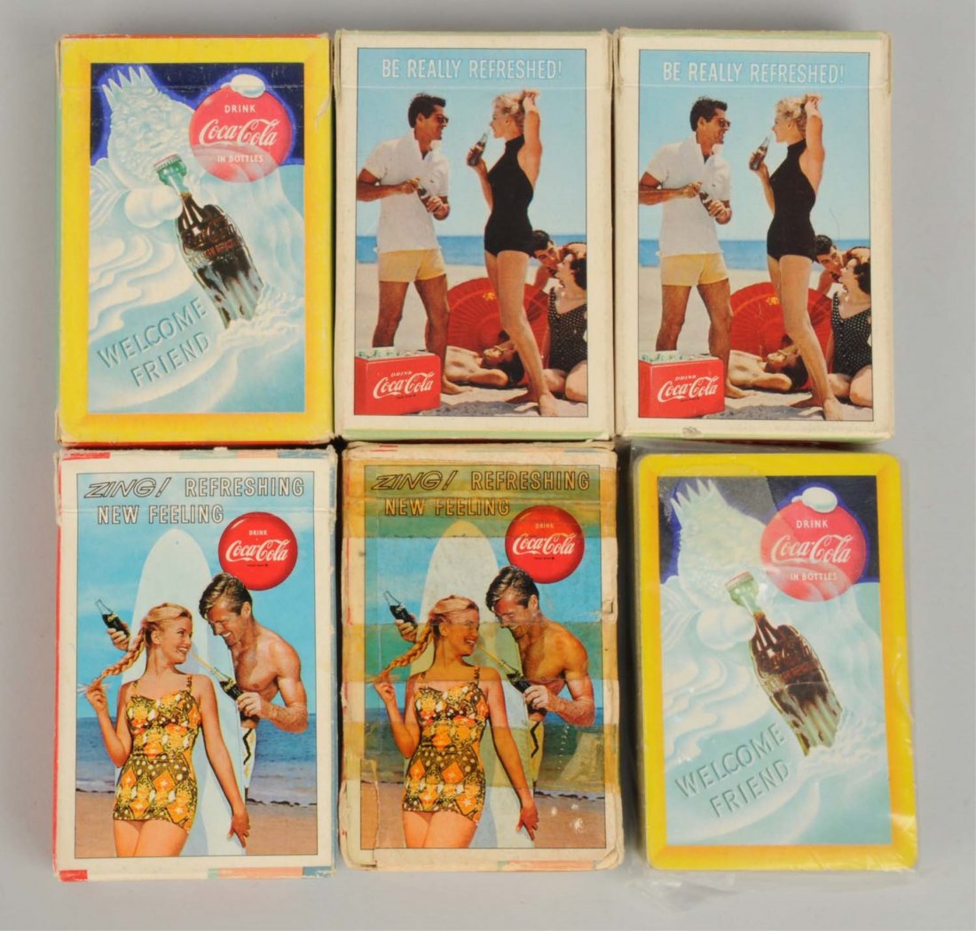Lot of 6: Coca - Cola Playing Card Decks.: This lot includes six decks from the 1950s - 60s. One box has heavy tape repair. Condition (Very Good - Excellent). Size Largest : 4" L