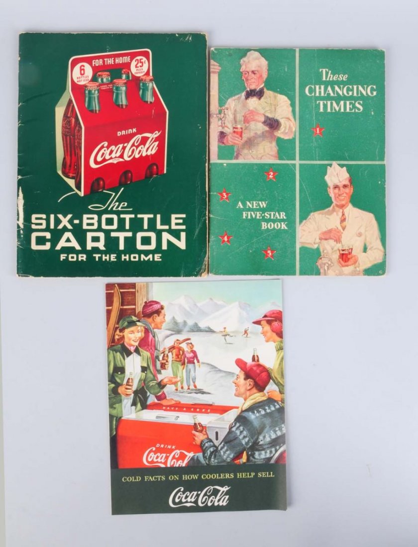 Lot of 3: Coca - Cola Paper Items.: This lot includes a 1937 merchandising book, a C. 1930 These Changing Times book and 1940s Westinghouse Coca - Cola cooler catalog. Condition (Very Good Plus). Size Largest: 12" L.