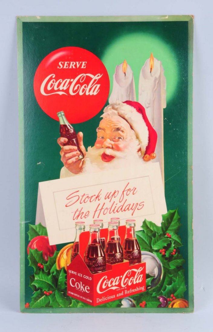1952 Coca - Cola Santa Cardboard Sign.: This cardboard sign has bumping to the corners and edges. A few small areas of loss at the top. Condition (Very Good). Size 27" L.