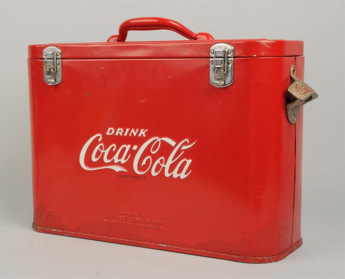 1940s Metal Coca -Cola Cooler.: This cooler has some minor scratching with a heavier area along the bottom edge. Condition (Very Good Plus). Size 16" L.