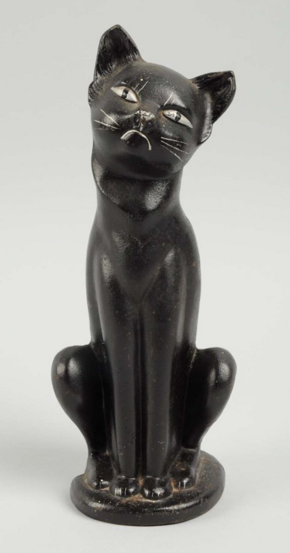 Cast Iron Deco Cat Doorstop.: Made by Hubley, catalog # 462. Condition (Excellent). Size 10" T.