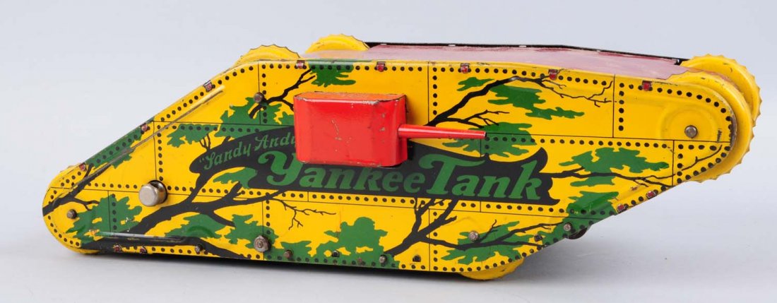 Tin Litho Yankee Tank Wind-Up Toy.: Slight tin scratches throughout otherwise the tank appears to be complete. Has beautiful tin litho colors on the sides of the tank depicting different trees and forests. Also has two cannons on both s