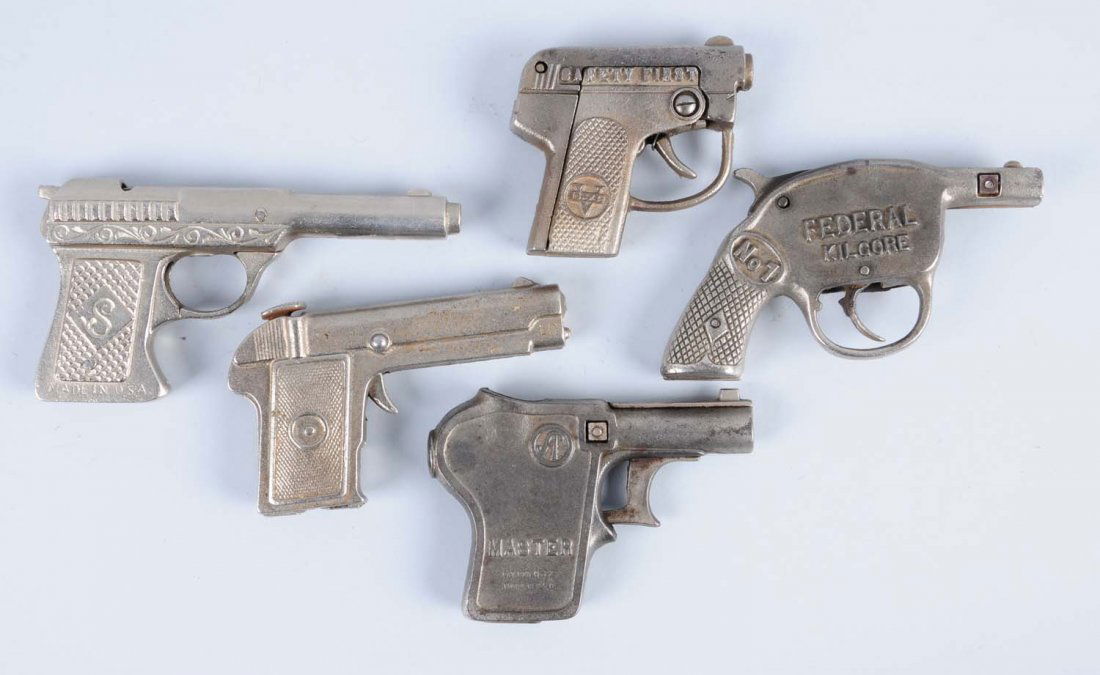 Lot of 5: Cast Iron Cap Pistols.: All made in U.S.A. There is a Victor, a Master, and three others. Condition (Very Good). Size Largest: 6"