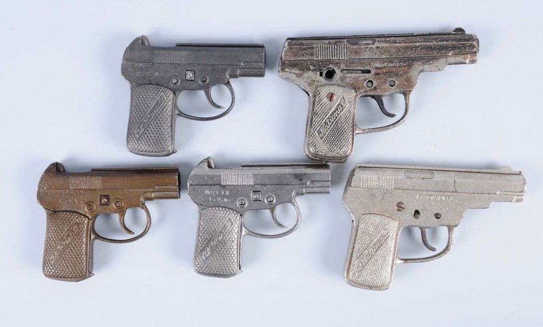 Lot of 5: Cast Iron Cap Pistols.: All the same style and all embossed National. Condition (Very Good). Size Largest: 5 7/8"