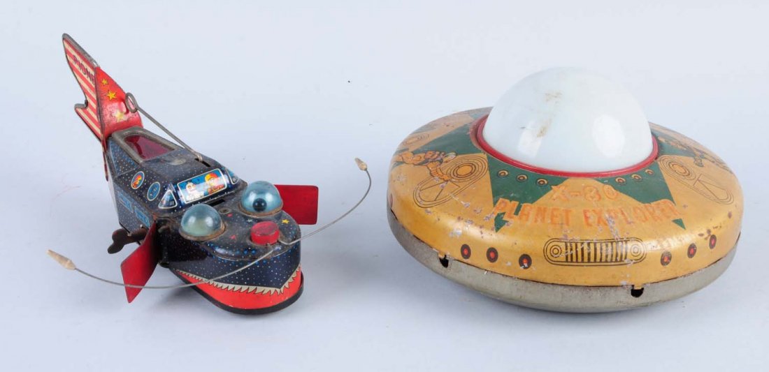 Lot of 2: Japanese Space Toys.: Includes a tin litho battery - operated X80 explorer space saucer, and a tin litho wind - up space whale. Both toys have scratches on the tin litho and spots of oxidation. The plastic dome on the spac