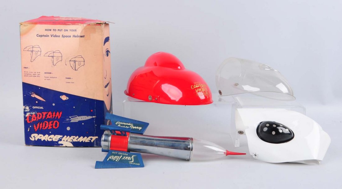 Lot of 2: Space Helmet and Space Patrol Rocket.: Both items are plastic. The space helmet has original box but the rocket does not. The rocket has wings on the side and a rubber tip on the end, supposed to be a light with a bulb, but the bulb is mis