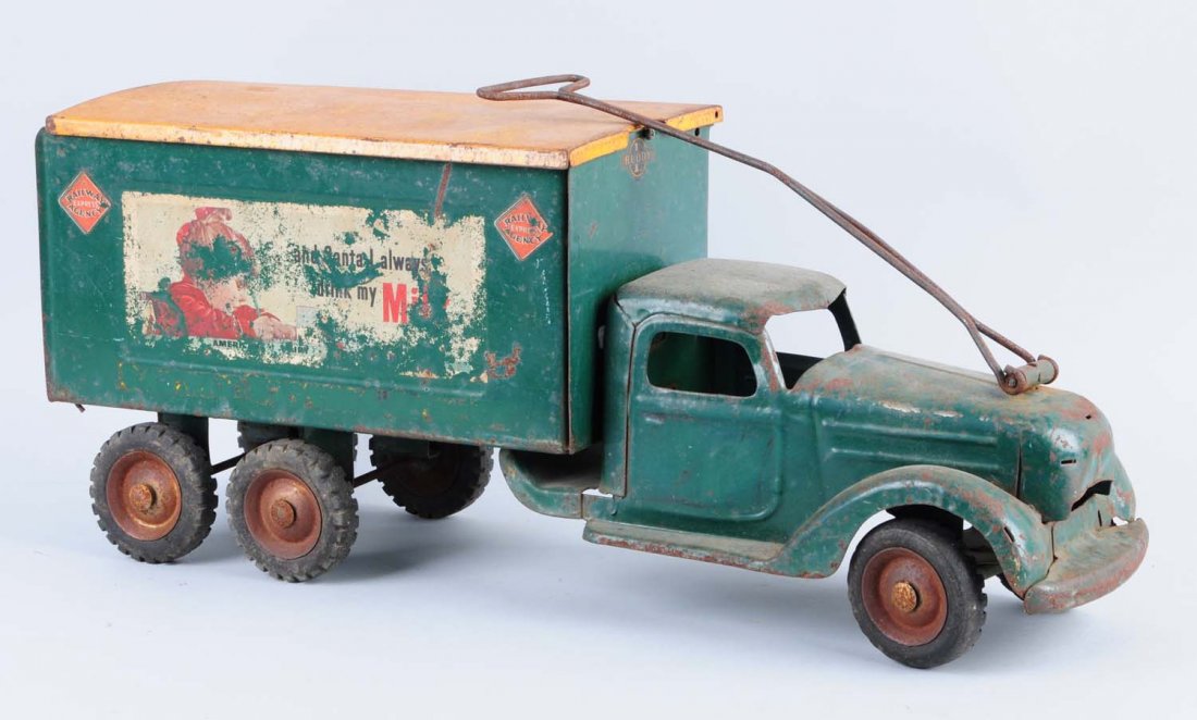Buddy L. Pressed Steel Boxed Pull Truck.: Entire truck has significant oxidation and rust. The decals have severe deterioration. Has original tires and Buddy L. is marked on the tires. Missing grille. Truck comes with back doors which open. C