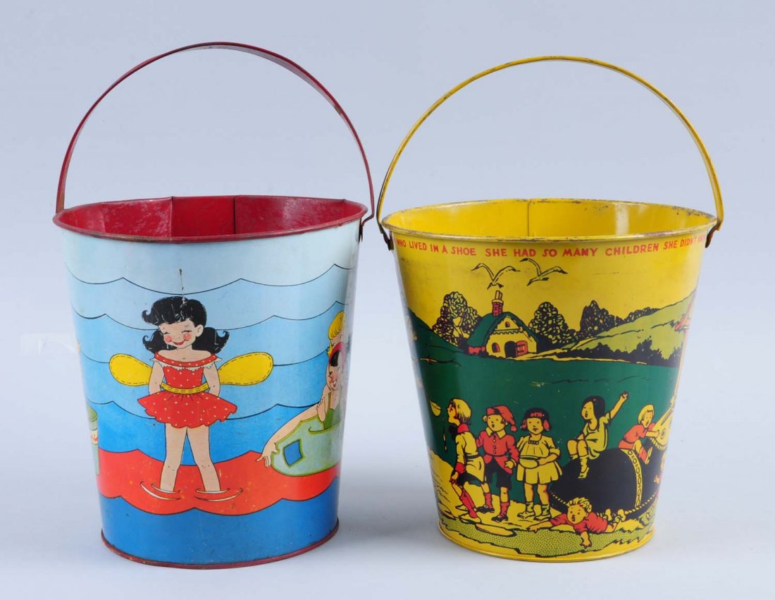 Lot of 2: Tin Sand Pails.: Has some scratches on the tin litho on the outside of both pails. Inside toward the bottom has some oxidation. Both pails include handles. Condition (Good - Very Good). Size Largest : 8" T.