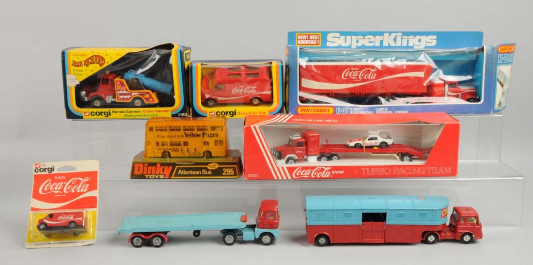 Lot of 8: Various Matchbox and Dinky Vehicles.: Includes three matchbox trucks, two corgi, one dinky bus and two chipperfield circus tractor and trailer. Includes original boxes. Some paper tears to boxes. Toys appear to be unopen and unplayed with