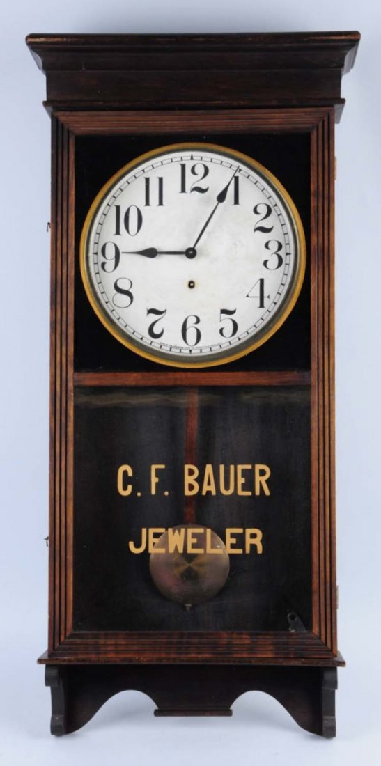 C.F Bauer Jewler Advertising Clock.: This clock advertises the C.F Bauer jewelry store. The face may be a replacement. Condition (Very Good Plus). Size 38" L.