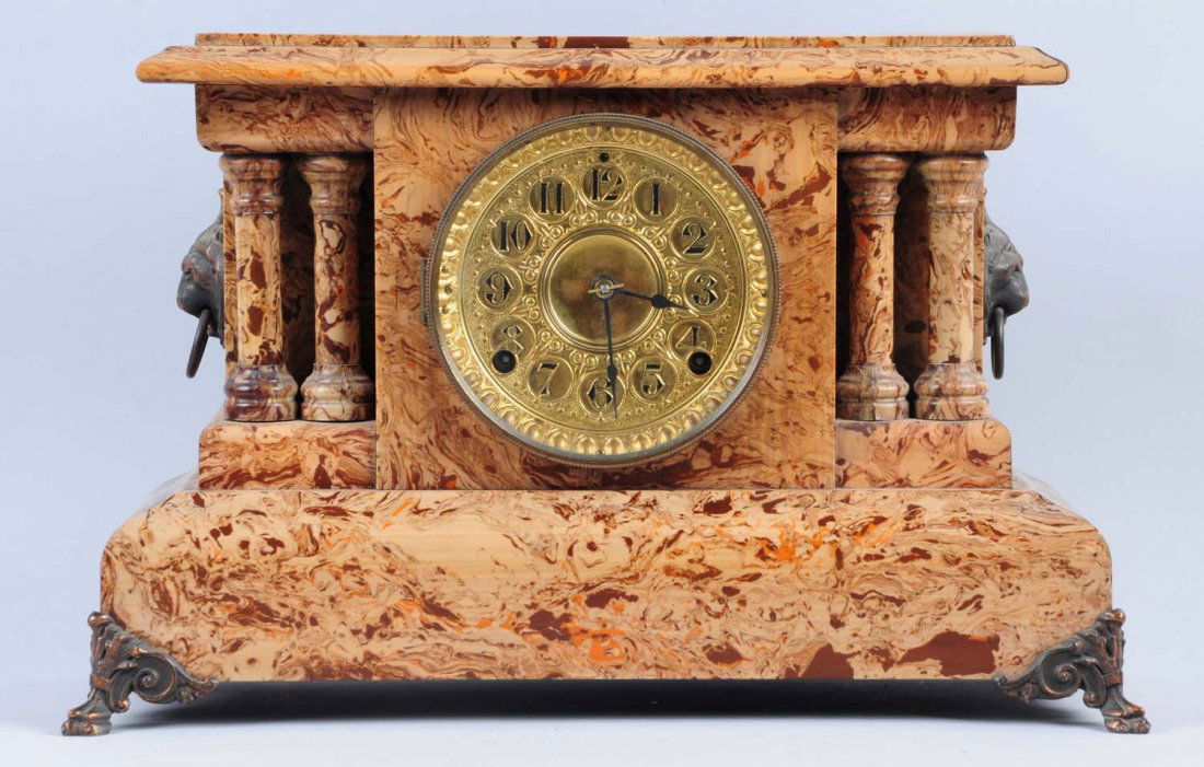 Seth Thomas Rosalyn Mantle Clock.: With simulated marble and lions heads. Time and strike clock. Has pendulum, but no key. Condition (Excellent). Size 17" L.