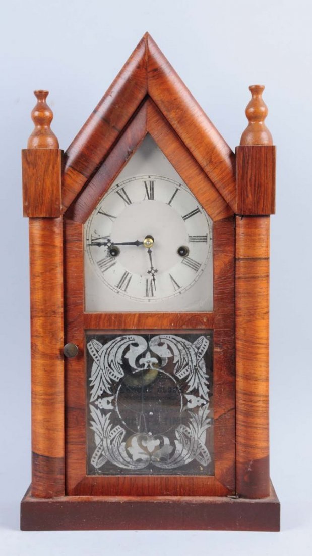 Waterbury Gothic No. 81 Clock.: Has key and pendulum. Time and strike clock. Condition (Excellent). Size 10 1/4" x 19 1/2"