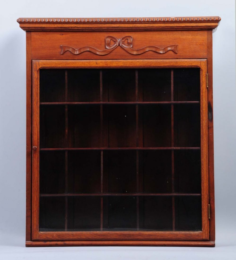 Glass Front Shaving Mug Display Cabinet.: This early oak cabinet is portioned for shaving mugs. Condition (Excellent). Size 34" T.