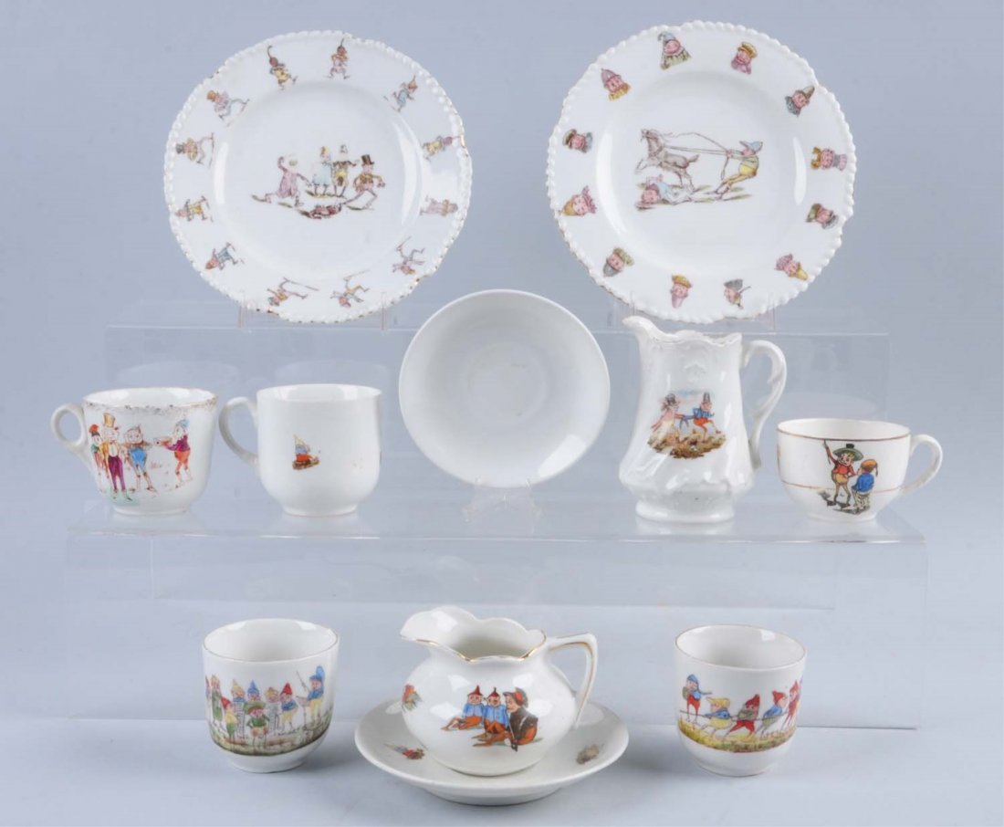 Brownies Childs Tea Set.: Includes: two matching cups, and three un matching cups, two 6" plates, two saucers, two creamers; one is a mother goose creamer. Condition (Very Good). Size Largest : 7 -1/2" Dia.
