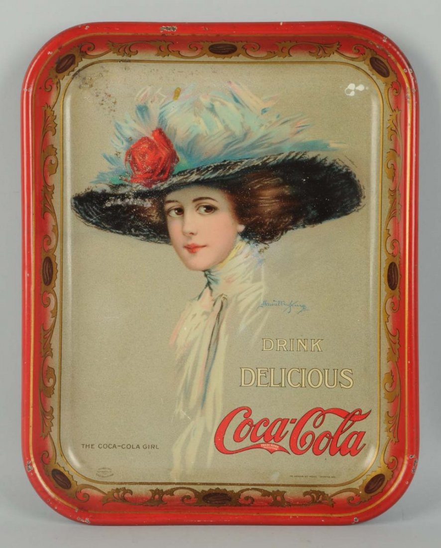 1910 Coca-Cola Serving Tray.: Shallow dents, color chips and small stains in top half. Rim nicks. Condition (Good - Very Good). Size 13 - 1/4" x 10 - 1/2".