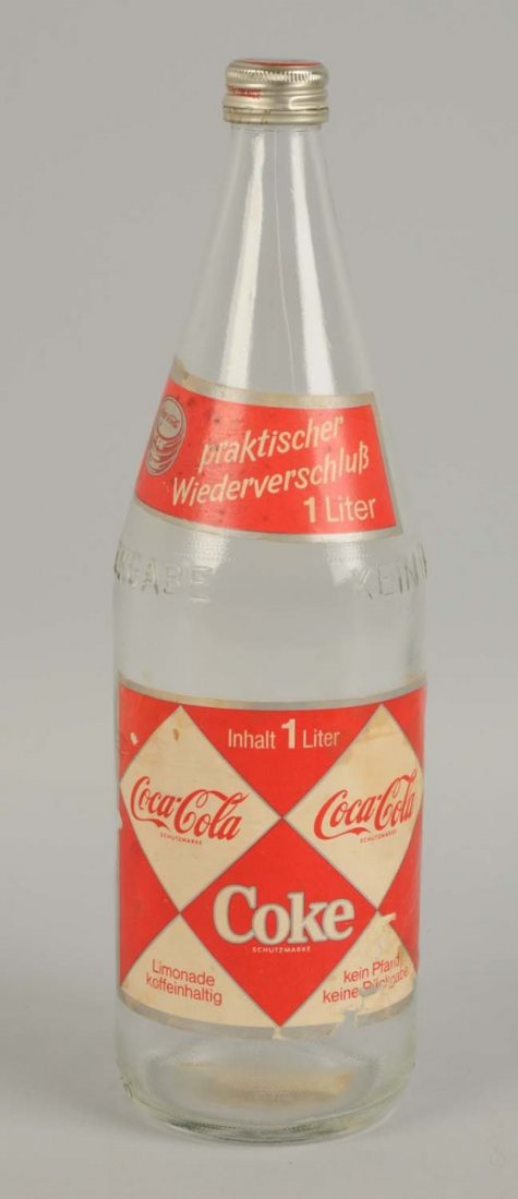 1960s European Paper Label Coca-Cola Bottle.: 1 Liter. Some stains and paper chips. Condition (Very Good Plus).