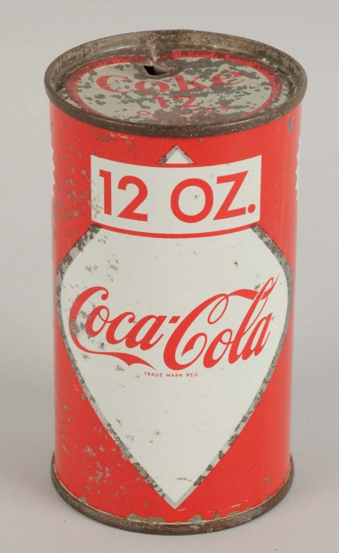 1960s Canadian Coca-Cola Diamond Can.: Some pitting and spot color loss. Tough to find! Condition (Very Good). Size 4 - 1/2" T.